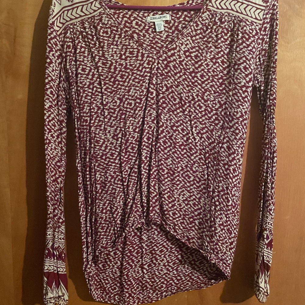 Long sleeve blouse. Goes great with vests.